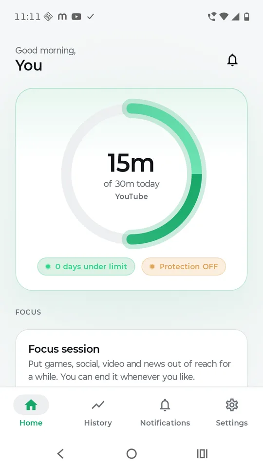 The home screen: a ring showing 15 minutes used of a 30 minute daily YouTube limit, with a streak counter below.